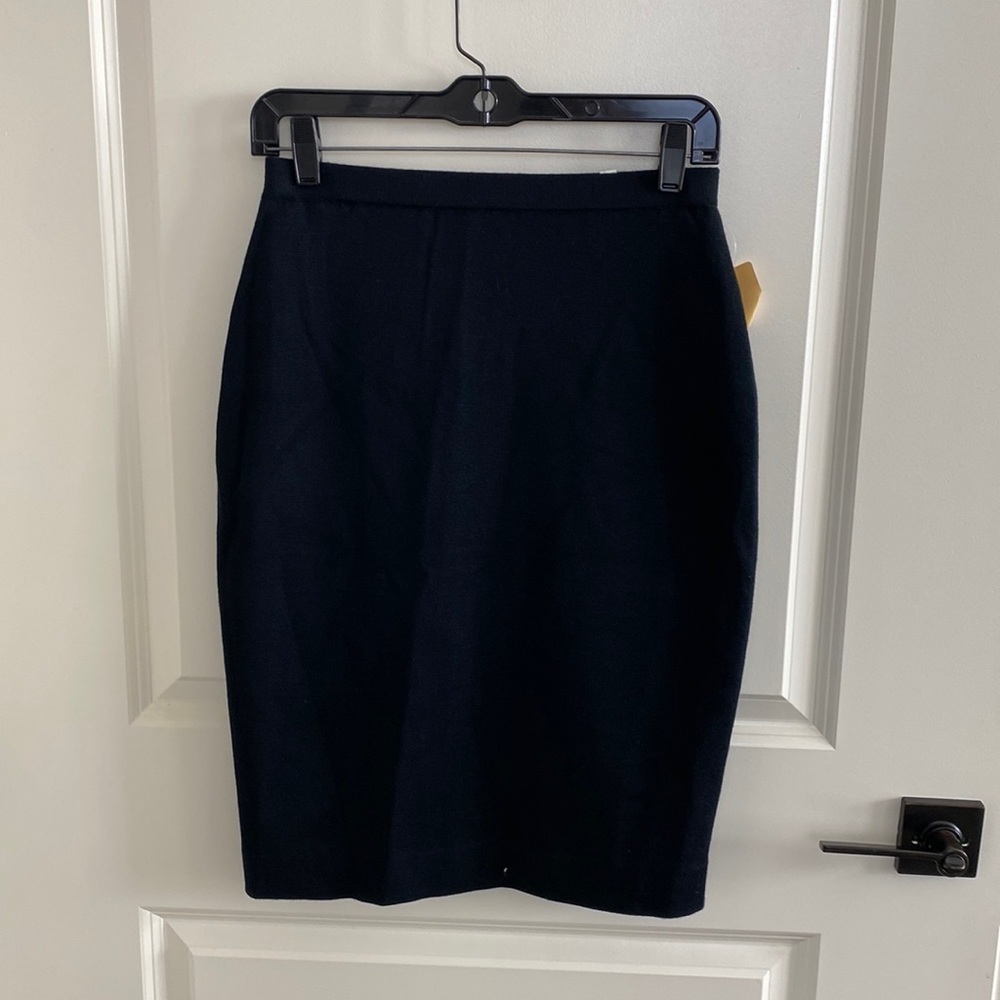 NWT formal midi skirt made of quality of fabric, available in S, M, and L